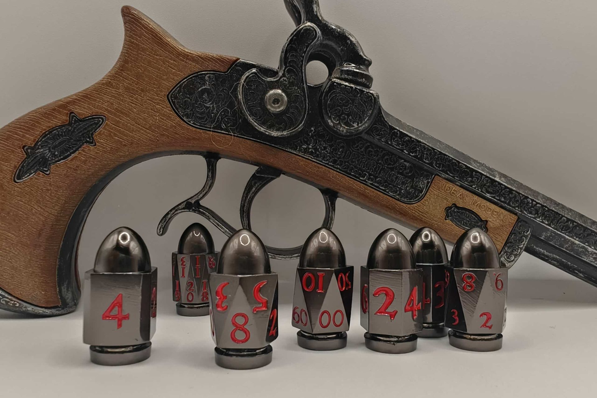 Shot set dadi proiettile nero e rosso gdr artefice D&D